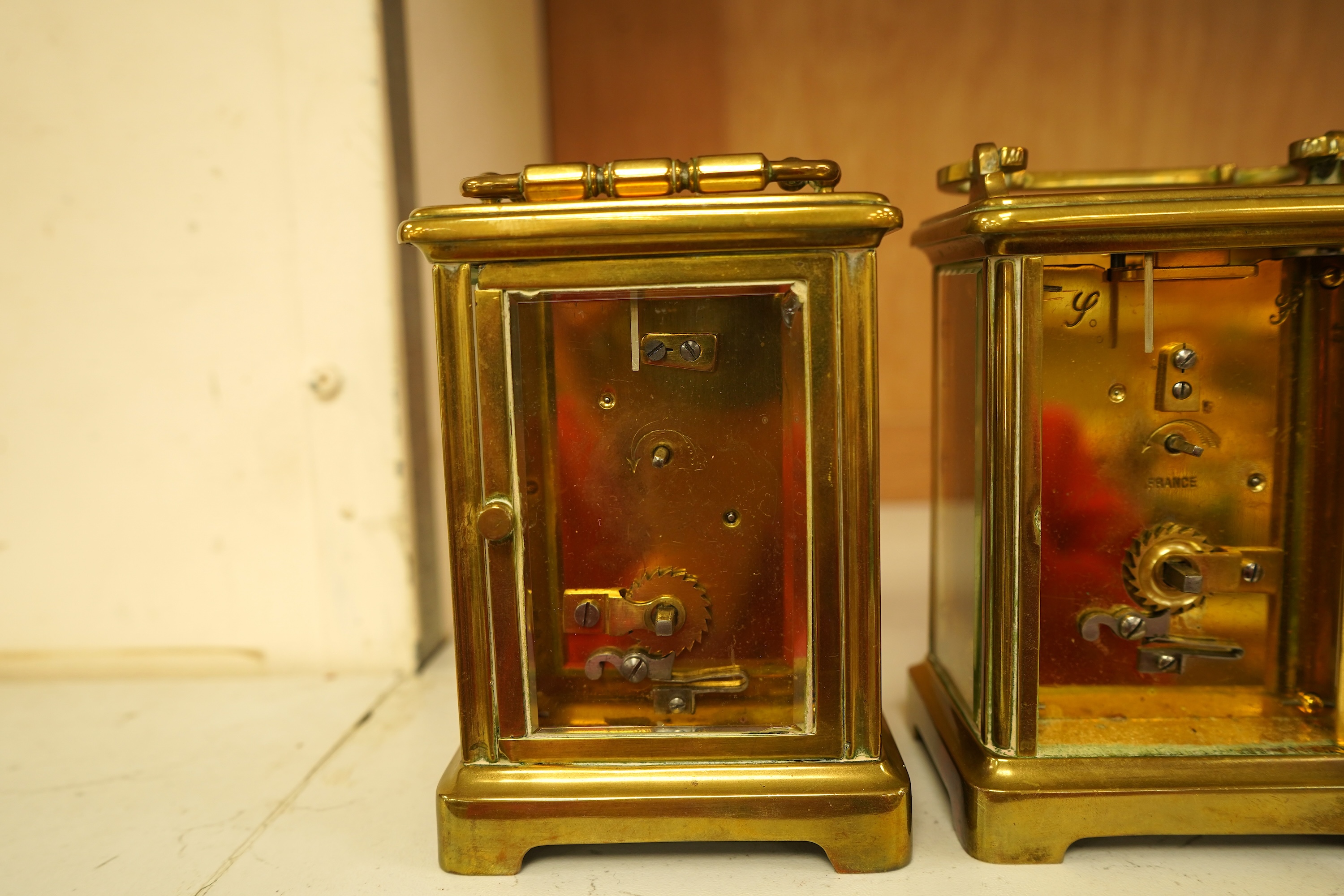 A lacquered brass champleve enamel carriage timepiece and one other, no keys, largest 15cm high